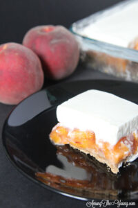 The best fall peach dessert featured by top Utah Lifestyle blog Among the Young: image of Peach Delight with peaches