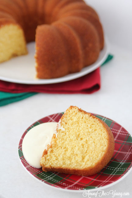 The Best Egg Nog Pound Cake featured by top Utah Foodie blog, Among the Young: image of slice of cake
