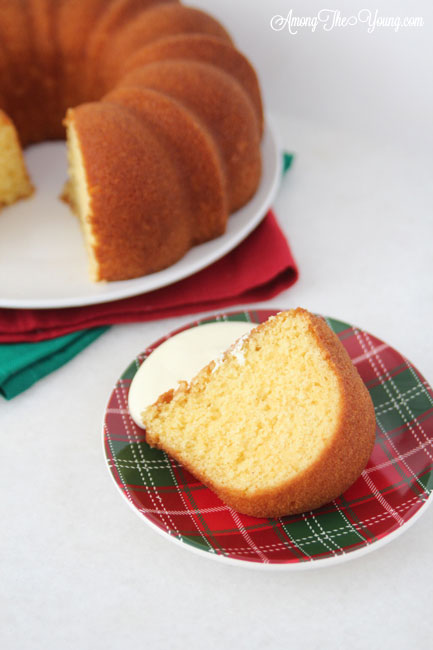 The Best Egg Nog Pound Cake featured by top Utah Foodie blog, Among the Young: image of piece of egg nog cake