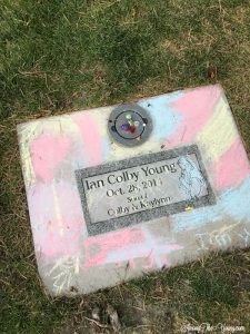How to help a child grieve featured by top Utah lifestyle blog, Among the Young: image of chalk on the grave"