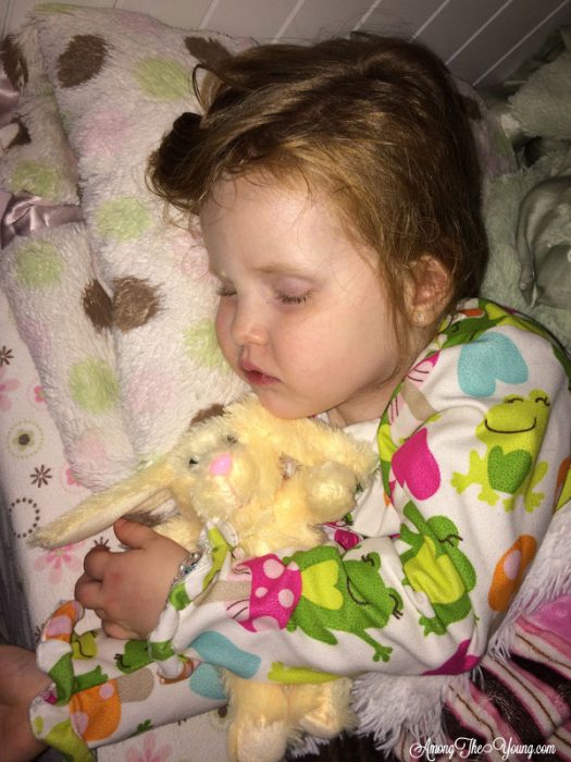 sibling loss featured by top Utah lifestyle blog, Among the Young: image of kid sleeping | Sibling Loss: 7 Essential Tips to Help your Child Grieve by popular Utah lifestyle blog, Among the Young: image of a little girl holding a stuffed bunny and sleeping.