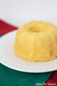 The Best Egg Nog cake recipe featured by top Utah Foodie blog, Among the Young: image of egg nog cake and green napkin
