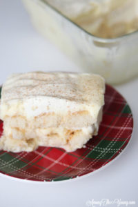 The Best Egg Nog Tiramisu featured by top Utah Foodie blog, Among the Young: image of piece of tiramisu | Egg Nog Pie by popular Utah lifestyle blog, Among the Young: image of a egg tiramisu. 