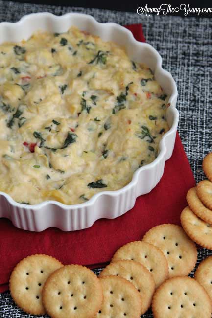 Easy Spinach and Artichoke Dip featured by top US food blog, Among the Young.
