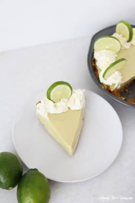 The Best Key Lime Pie featured by top Utah Foodie blog, Among the Young | Summer Dessert Ideas: Easy Key Lime Pie Recipe by popular Utah food blog, Among the Young: image of a Key Lime Pie.