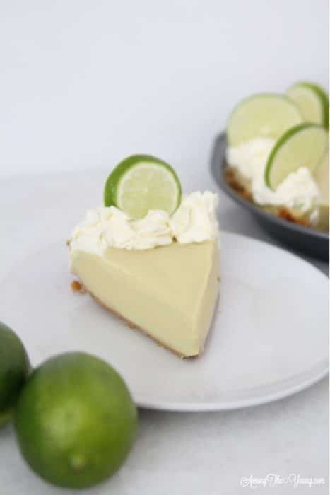 The Best Key Lime Pie featured by top Utah Foodie blog, Among the Young | Summer Dessert Ideas: Easy Key Lime Pie Recipe by popular Utah food blog, Among the Young: image of a Key Lime Pie.