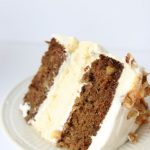 Carrot cake cheesecake cake featured by top Utah Foodie blog, Among the Young: image of cake close up