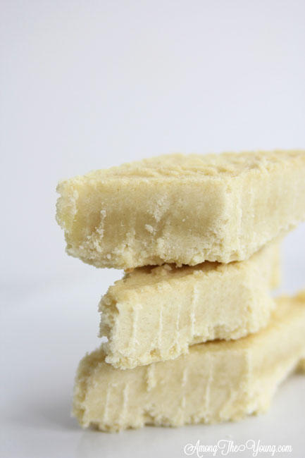 The Best Scottish Shortbread recipe featured by top Utah Foodie Among the Young: image of scottish shortbread recipe staked and close up | Traditional Scottish Shortbread Recipe for the Holidays by popular Utah food blog, Among the Young; image of Scottish shortbread.