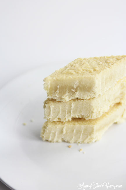 The Best Scottish Shortbread recipe featured by top Utah Foodie Among the Young: image of scottish shortbread recipe triangles stacked | Traditional Scottish Shortbread Recipe for the Holidays by popular Utah food blog, Among the Young; image of Scottish shortbread.