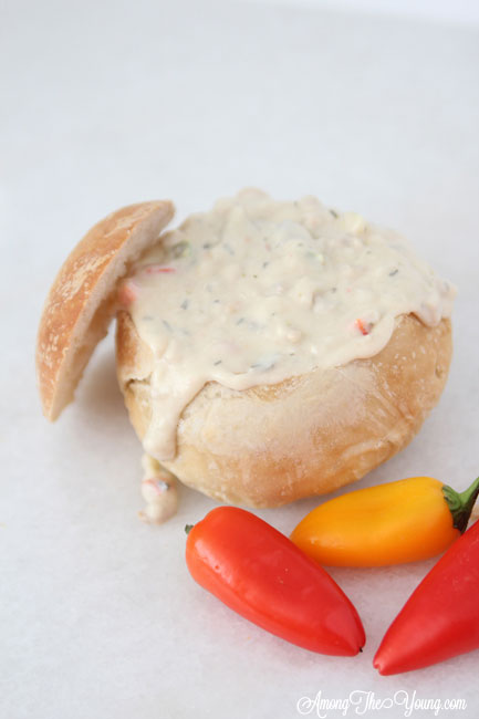 The best Disneyland Clam chowder recipe featured by top Utah Foodie blog, Among the Young: image of clam chowder recipe white background | Copycat Recipes: Disneyland Clam Chowder Recipe by popular Utah food blog, Among the Young: image of copycat Disneyland clam chowder in a bread bowl. 