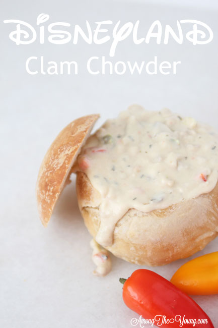 The best Disneyland Clam chowder recipe featured by top Utah Foodie blog, Among the Young: image of clam chowder PIN | Copycat Recipes: Disneyland Clam Chowder Recipe by popular Utah food blog, Among the Young: image of copycat Disneyland clam chowder in a bread bowl. 