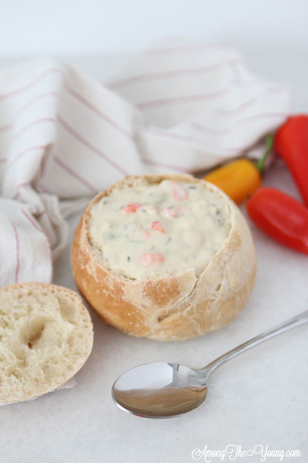 The best Disneyland Clam chowder recipe featured by top Utah Foodie blog, Among the Young: image of clam chowder flat lay close up | Copycat Recipes: Disneyland Clam Chowder Recipe by popular Utah food blog, Among the Young: image of copycat Disneyland clam chowder in a bread bowl. 