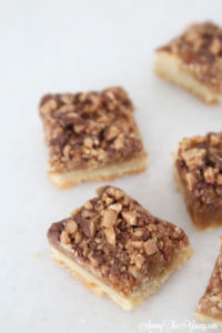 The Best Almond Roca Cookie bars featured by top Utah Foodie blog, Among the Young: image of Almond Roca Cookie Bars close up