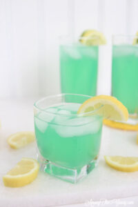 alt="The best Disneyland Mint Julep copycat recipe featured by top Utah Foodie blog, Among the Young: image of lots of mint juleps