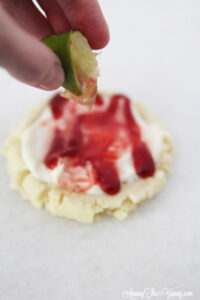 The most amazing raspberry lime sugar cookies featured by top Utah Foodie blog Among the Young: image of lime drizzle