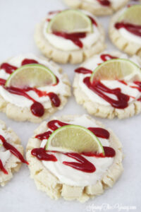 The most amazing raspberry lime sugar cookies featured by top Utah Foodie blog Among the Young: image of close up diagonal cookies