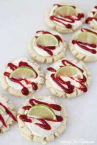 The most amazing raspberry lime sugar cookies featured by top Utah Foodie blog Among the Young: image of cookies placed diagonally
