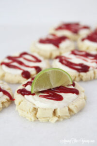 The most amazing raspberry lime sugar cookies featured by top Utah Foodie blog Among the Young: image of cookies in a diagonal line