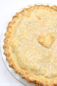 Classic pie crust recipe by top Utah Foodie Among the Young: image of baked pie with heart in the middle
