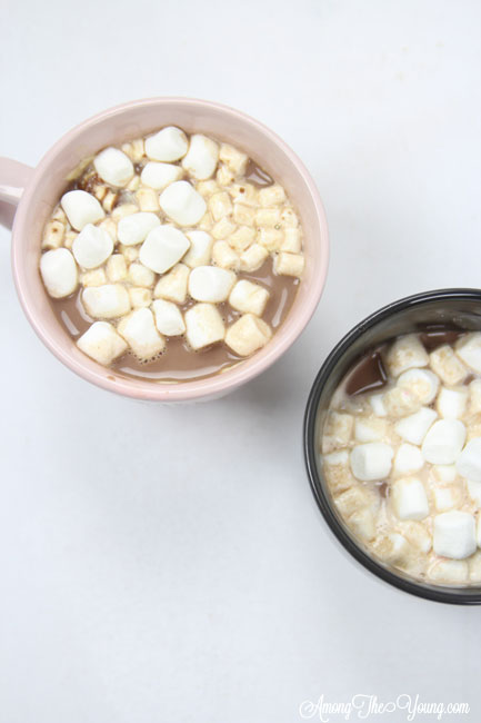 Hot chocolate recipe by top Utah Foodie Among the Young: image of two cocoa mugs and mallows |Hot Chocolate Recipe by popular Utah lifestyle blog, Among the Young: image of two mugs of hot chocolate. 