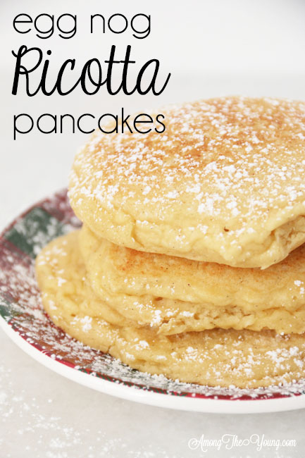 The best ricotta pancakes recipe featured by top Utah Foodie Among the Young: image of pancakes stacked pin |Ricotta Pancakes by popular Utah lifestyle blog, Among the Young: Pinterest image of egg nog ricotta pancakes. 