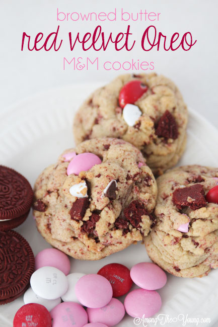 The Best Valentines Cookie featured by top Utah Foodie blog Among the Young: image of red velvet cookies on a plate | Browned Butter Cookies by popular Utah food blog, Among the Young: Pinterest image of browned butter red velvet Oreo M&M cookies. 