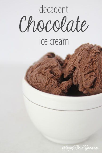 The Best Chocolate ice cream featured by top Utah Foodie blog Among the Young: image of PIN 2 | Chocolate Ice Cream Recipe by popular Utah food blog, Among the Young: image of chocolate ice cream in some white stacked ceramic bowls and a metal ice cream scoop. 