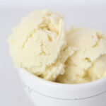 The Best vanilla bean ice cream featured by top Utah Foodie blog Among the Young: image of vanilla bean ice cream in a bowl close up