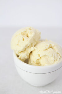 The Best vanilla bean ice cream featured by top Utah Foodie blog Among the Young: image of vanilla bean ice cream in a bowl