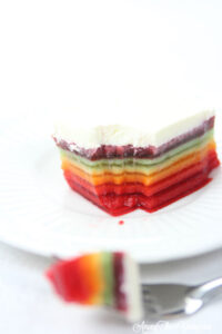 The best rainbow Jello featured by top Utah Foodie blog Among the Young: image of Jello bite
