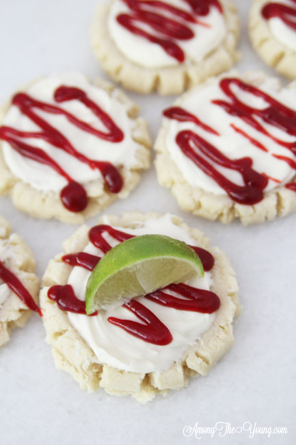 The most amazing raspberry lime sugar cookies featured by top Utah Foodie blog Among the Young: image of cookies from above | Key Lime Raspberry Sugar Cookies by popular Utah food blog, Among the Young: image of key lime raspberry sugar cookies.