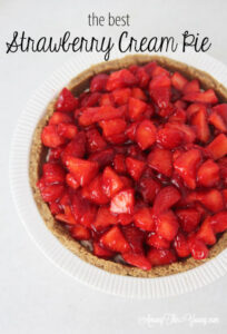 The best strawberry cream pie featured by top Utah Lifestyle blog Among the Young: image of strawberry cream pie PIN 2