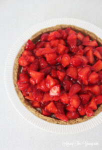 The best strawberry cream pie featured by top Utah Lifestyle blog Among the Young: image of strawberry cream pie repeat pin