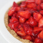 The best strawberry cream pie featured by top Utah Lifestyle blog Among the Young: image of strawberry cream pie close up